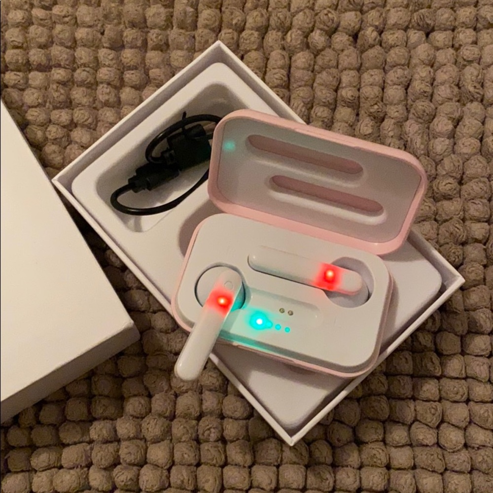 Pink wireless headphones by True Wireless